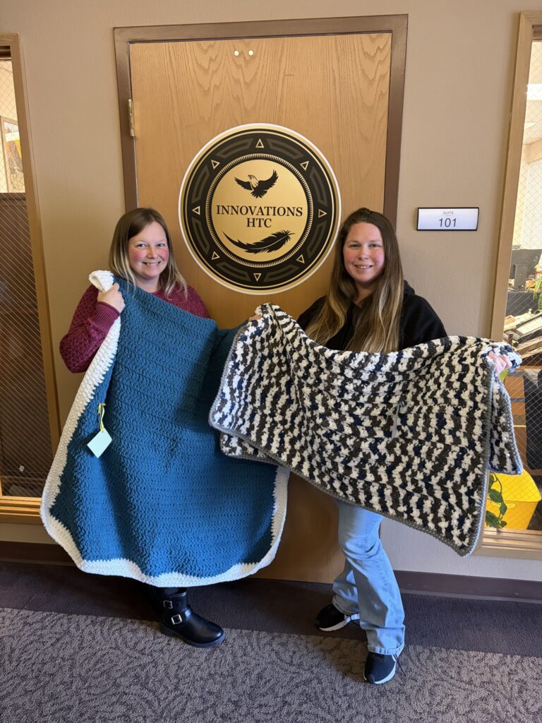Sam and Mekenzie with donated blankets by St. Johns Lutheran Church.